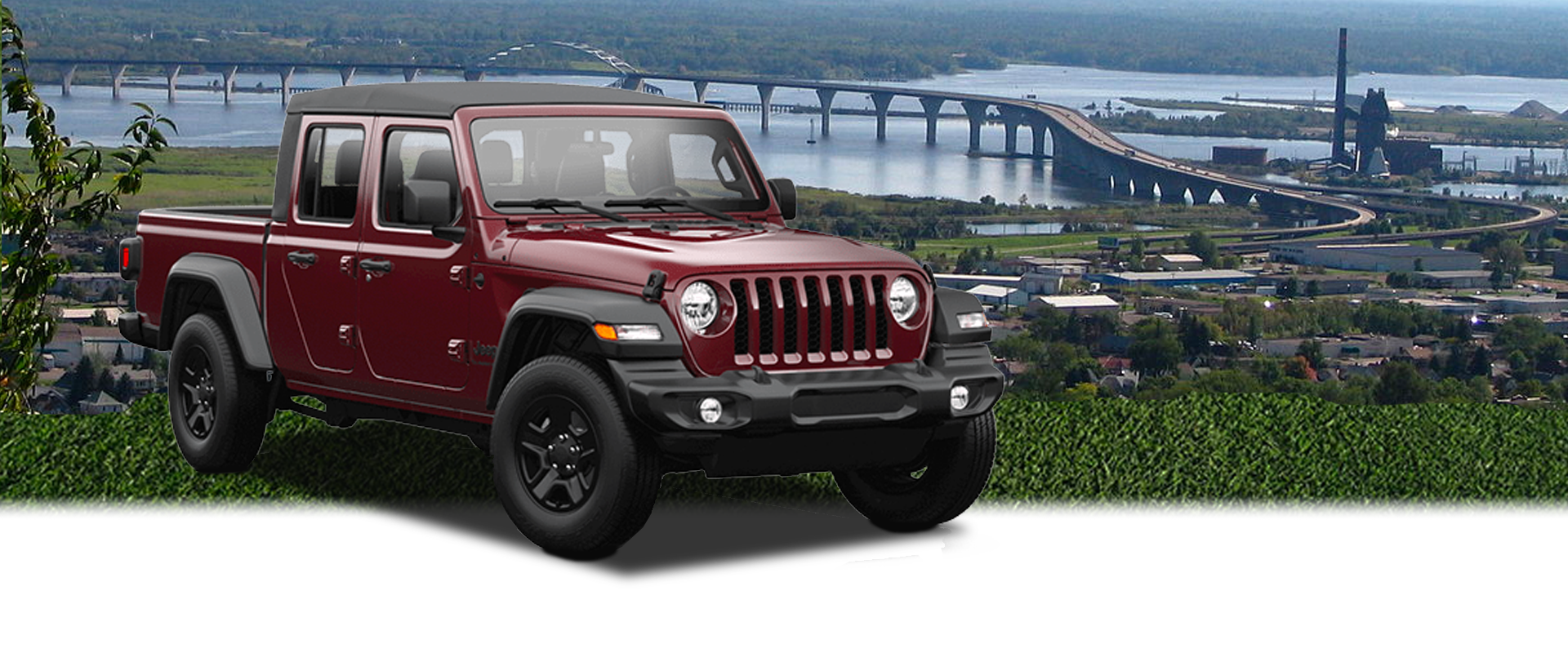 2023 Jeep Gladiator Maroon near the Bong Bridge